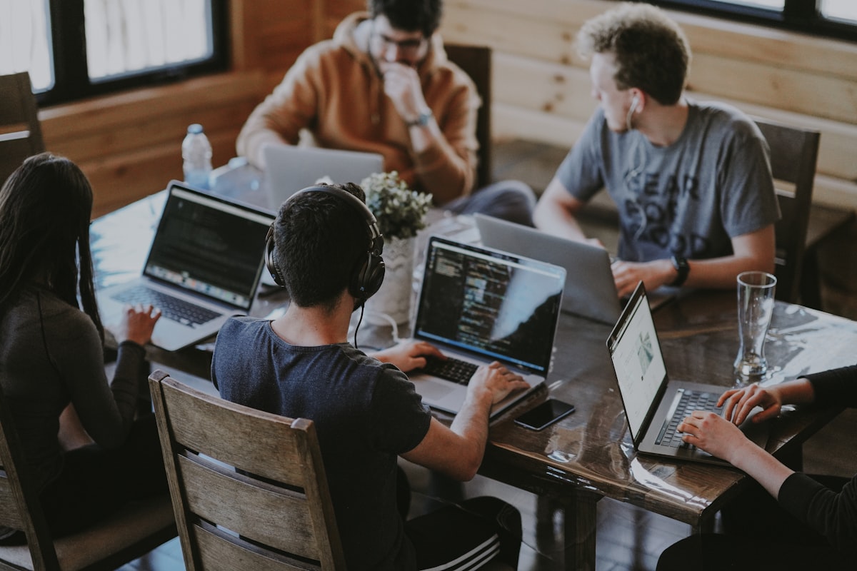 Remote workers at a bright coworking space