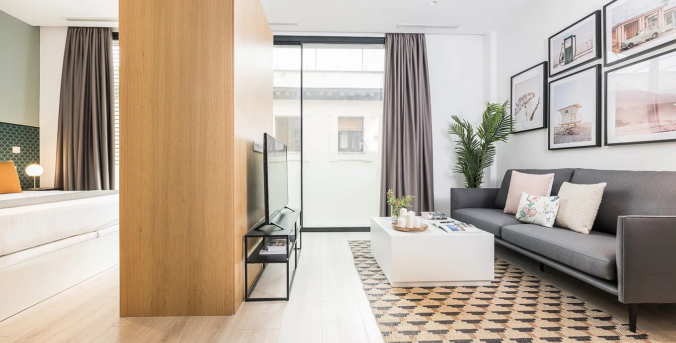 Trendy Madrid Flat With Cozy Workspace For Seamless Remote Work